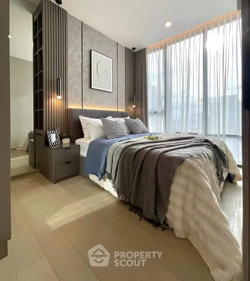 Luxurious modern bedroom with floor-to-ceiling windows and elegant decor.