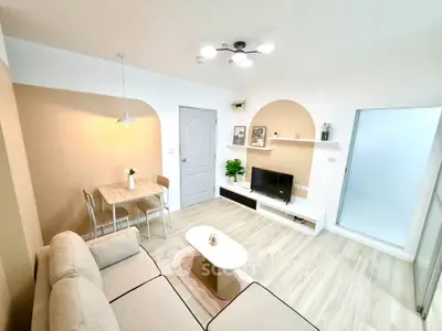 Modern living room with stylish decor and cozy seating area