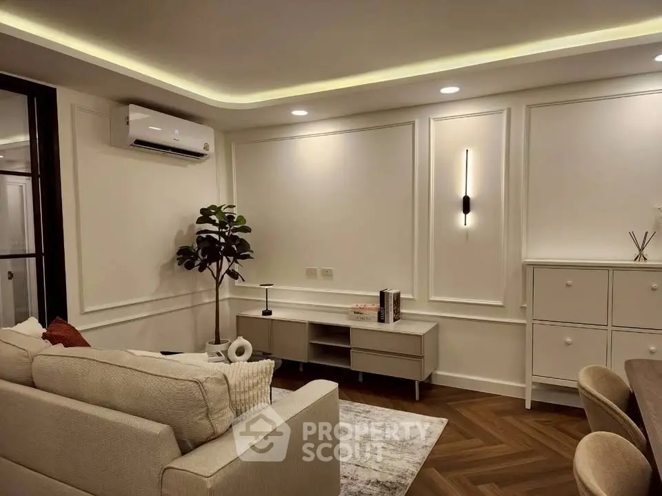 Elegant modern living room with stylish decor and ambient lighting
