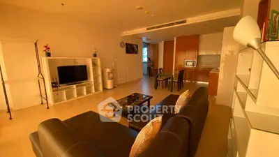 Spacious modern living room with open kitchen and stylish furnishings