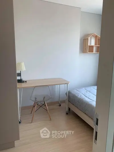 Cozy minimalist bedroom with study desk and modern decor