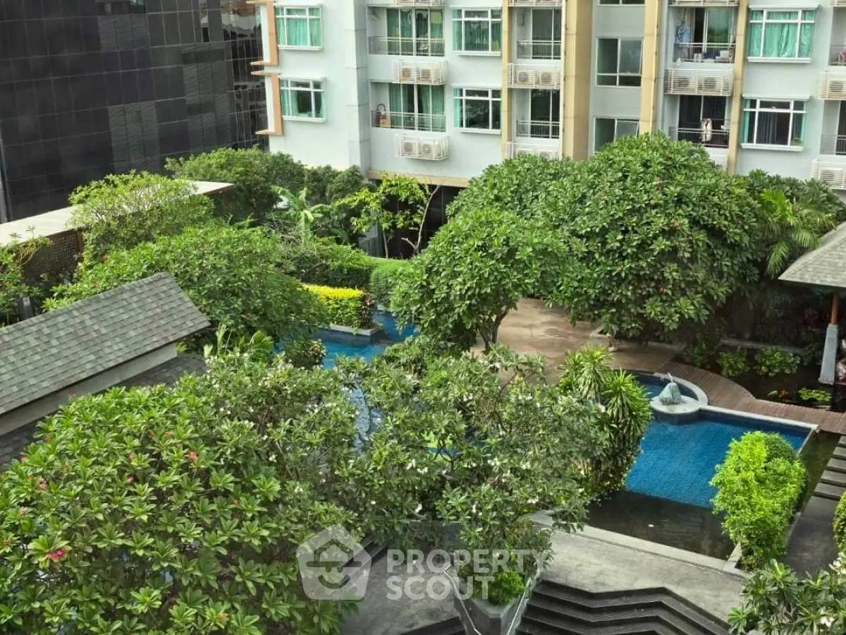 Luxurious garden view with pool in modern apartment complex