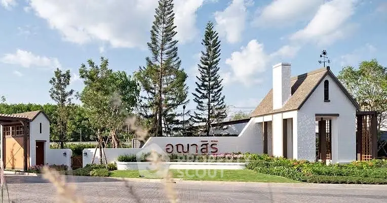 Charming residential entrance with lush landscaping and modern architecture