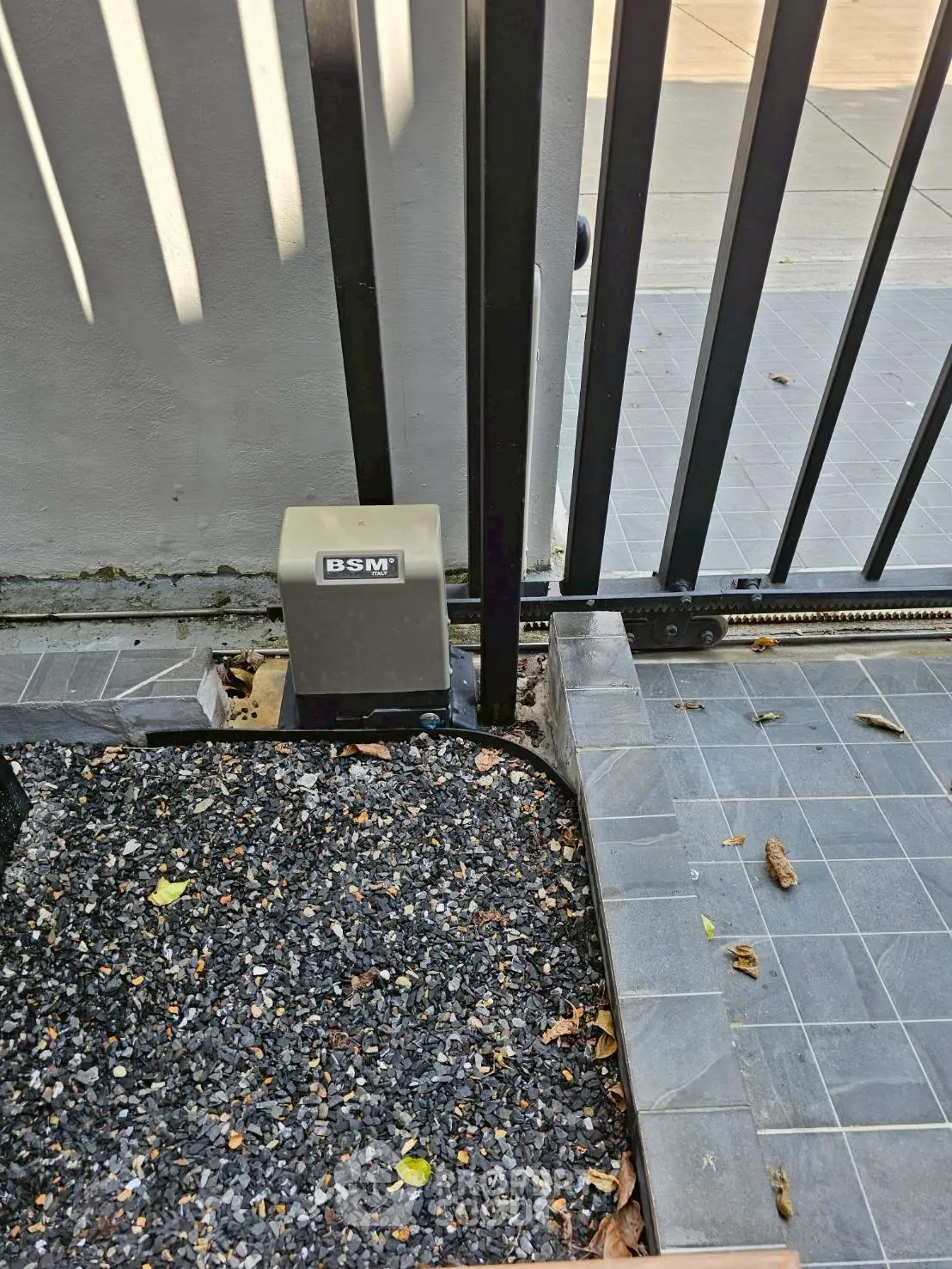 Modern gate with automated sliding mechanism and sleek design