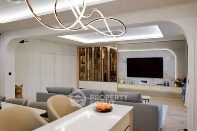 Luxurious modern living room with stylish lighting and elegant decor