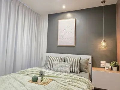 Cozy modern bedroom with stylish decor and soft lighting