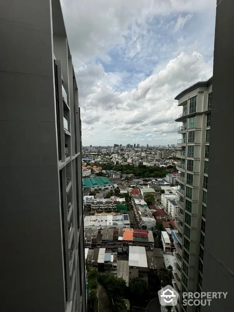 Stunning cityscape view from high-rise building balcony