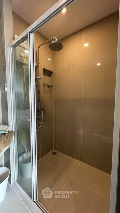 Modern bathroom with sleek shower enclosure and contemporary fixtures