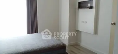 Cozy bedroom with natural light and modern design