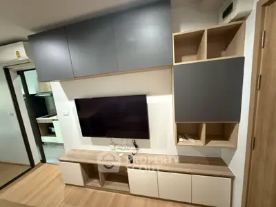 Modern living room with sleek TV unit and stylish storage solutions