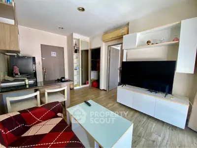 Modern living room with stylish furniture and open layout in a cozy apartment.