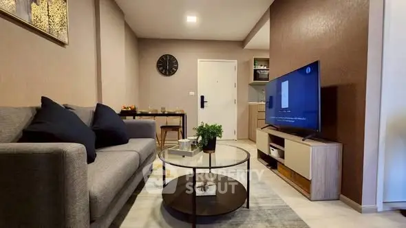 Modern living room with stylish decor and cozy ambiance.