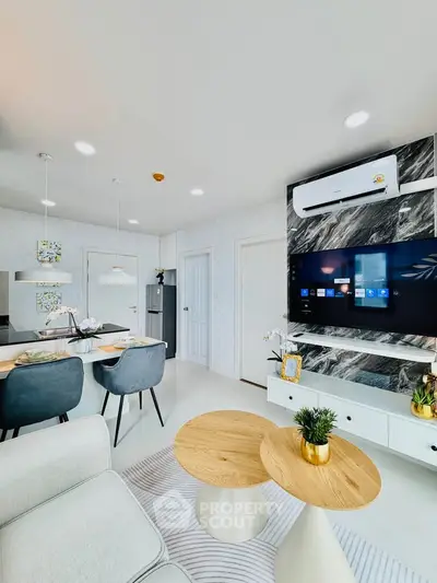 Modern living room with stylish decor, open layout, and sleek furniture in a contemporary apartment.
