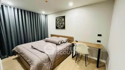 Modern bedroom with stylish decor and cozy ambiance