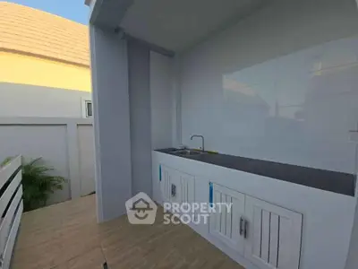 Modern outdoor kitchen with sleek design and ample counter space