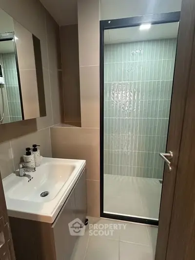 Modern bathroom with sleek design and glass shower enclosure