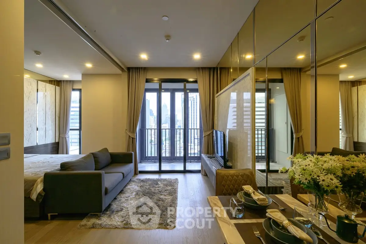 Luxurious modern studio apartment with city view, elegant decor, and open layout.