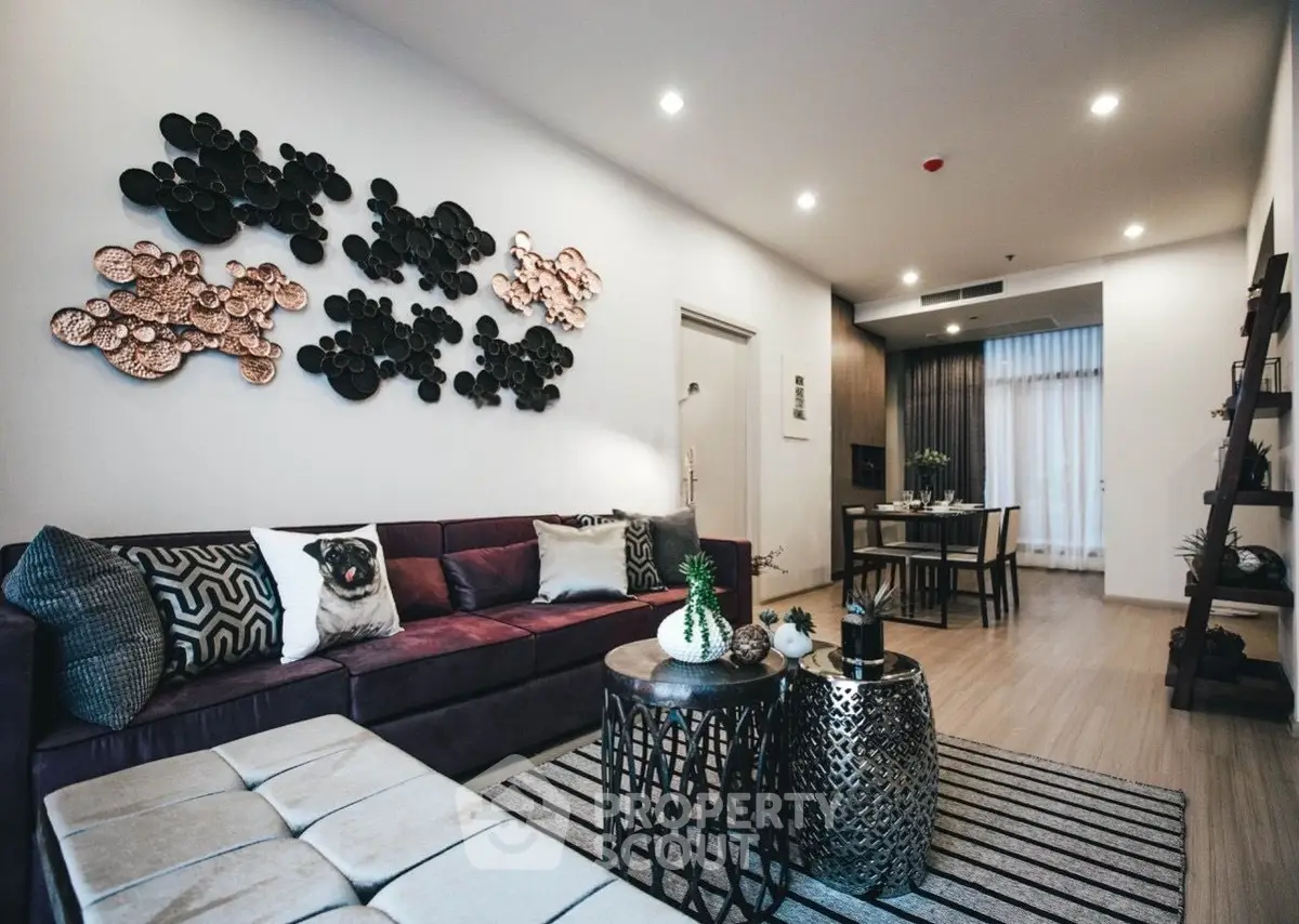 Stylish modern living room with elegant decor and open layout, perfect for entertaining.
