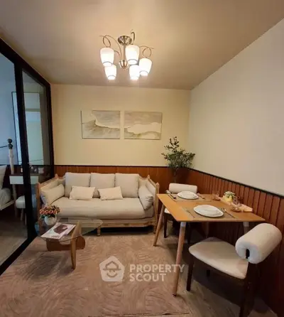 Cozy living room with elegant dining area and modern decor