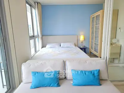 Bright and cozy bedroom with modern decor and large windows