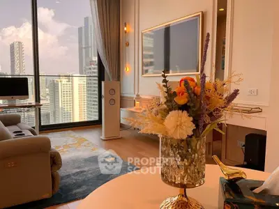 Luxurious living room with stunning city view, elegant decor, and modern furnishings in high-rise apartment.