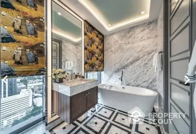 Luxurious bathroom with marble walls, freestanding bathtub, and city view.