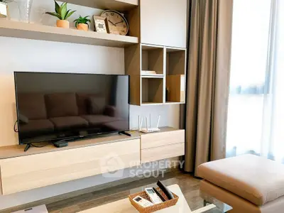 Modern living room with sleek TV and stylish shelving