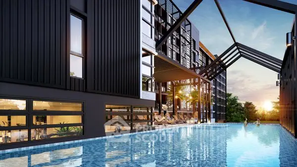 Modern apartment building with luxurious outdoor pool and sunset view.