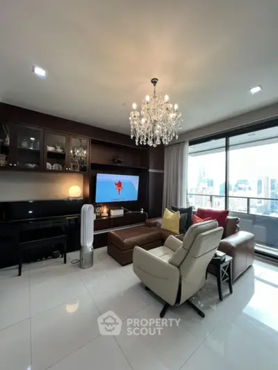 Luxurious living room with chandelier and city view balcony