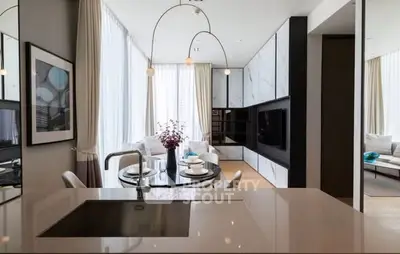 Luxurious modern living room with open kitchen and elegant decor