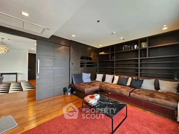 Luxurious living room with modern design, spacious seating, and elegant decor.