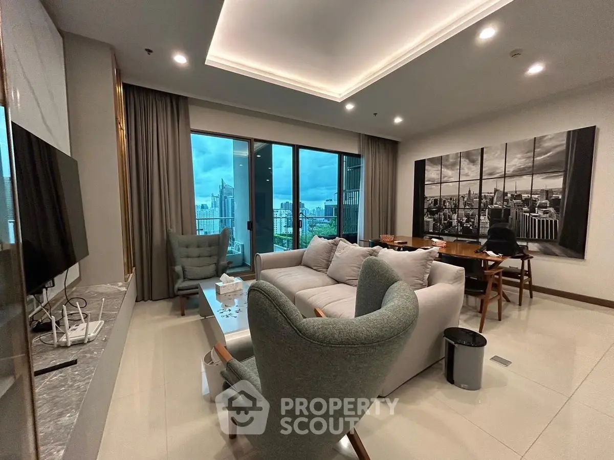 Luxurious living room with stunning city view, modern furniture, and elegant decor in high-rise apartment.