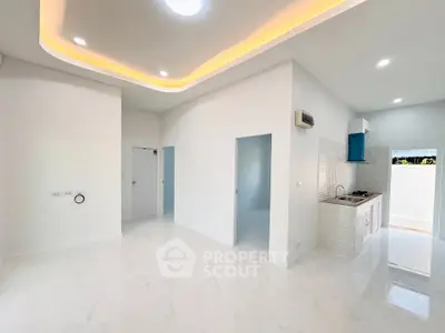 Modern open layout kitchen with sleek design and bright lighting