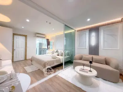 Modern studio apartment with stylish decor and cozy living area