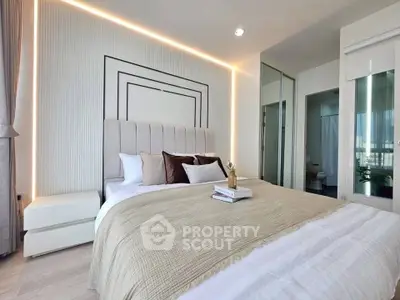 Luxurious modern bedroom with elegant lighting and stylish decor