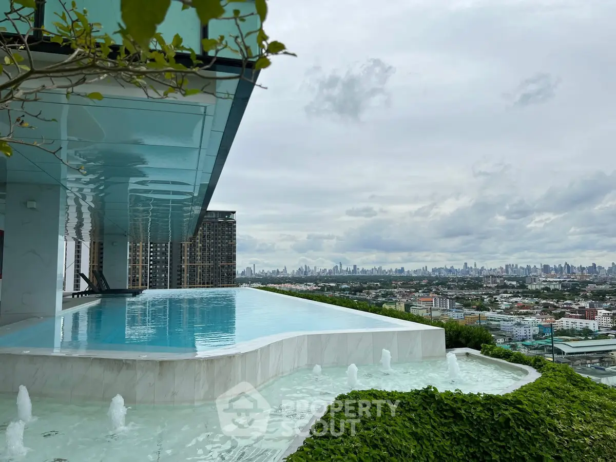 Luxurious rooftop infinity pool with stunning city skyline view