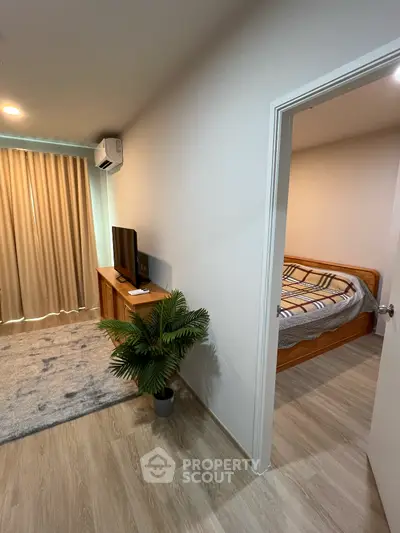 Cozy bedroom with wooden furniture and modern decor in a bright apartment