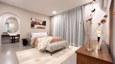 Luxurious modern bedroom with elegant decor and soft lighting, perfect for relaxation.