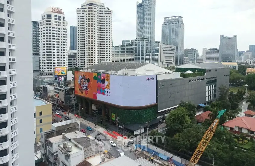 Stunning cityscape view featuring modern high-rise buildings and bustling urban environment.