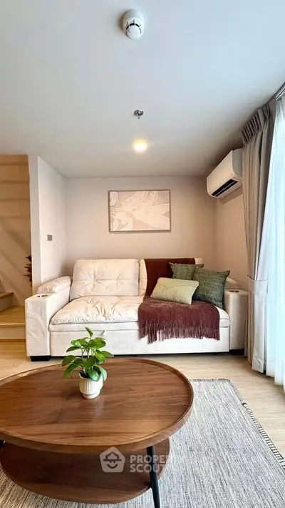 Cozy living room with modern decor and natural light