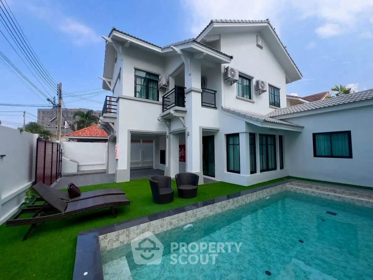 Stunning modern villa with private pool and lush garden, perfect for luxury living.