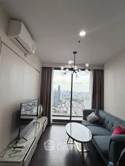 Modern living room with stunning city view, stylish furniture, and elegant lighting.