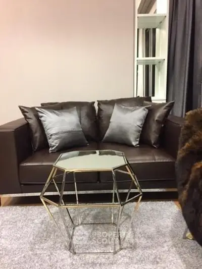 Stylish living room with modern sofa and geometric coffee table