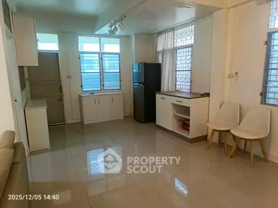 Spacious kitchen with modern appliances and sleek design