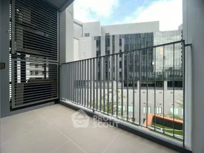 Modern balcony with city view and sleek railing design