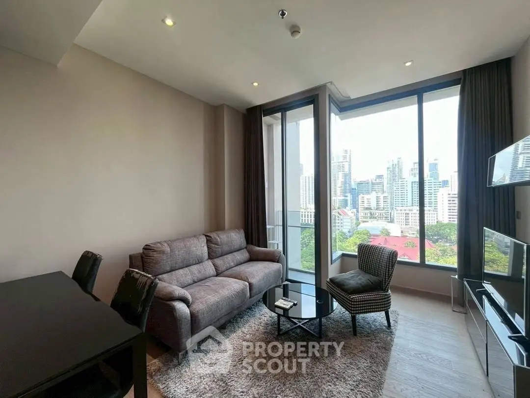 Modern living room with stunning city view and cozy furniture