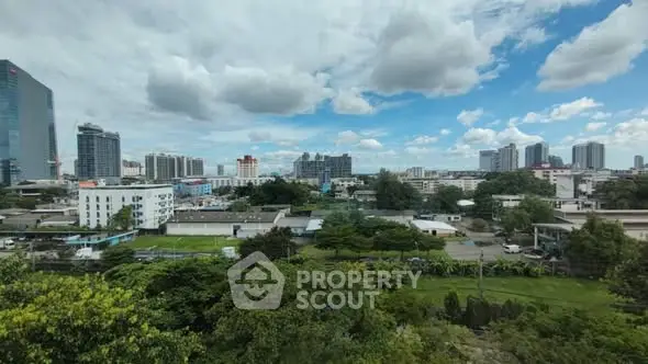 Stunning cityscape view with lush greenery and modern skyline