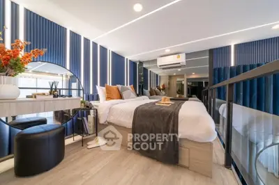 Luxurious modern bedroom with stylish decor and ample natural light