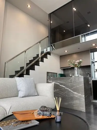 Modern duplex living room with elegant staircase and stylish decor