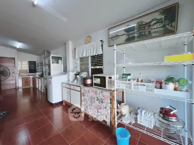 Spacious kitchen with open layout and modern appliances
